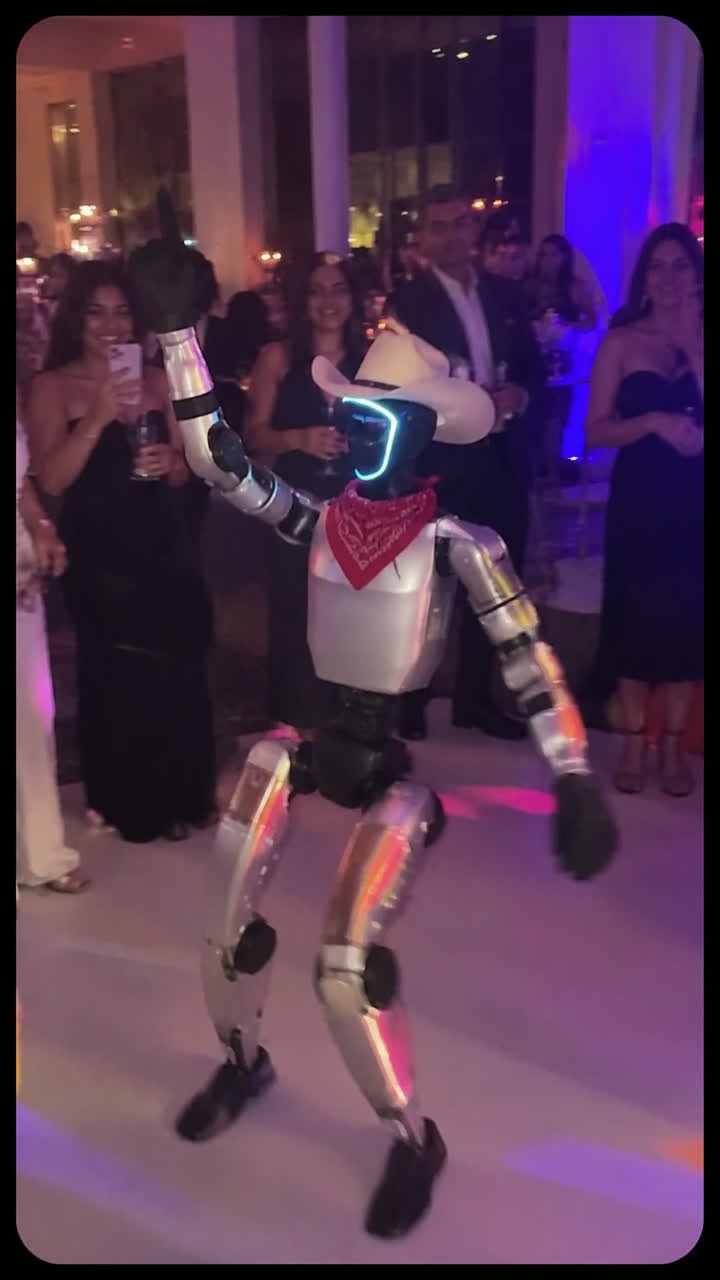 Humanoid robot at an evening party